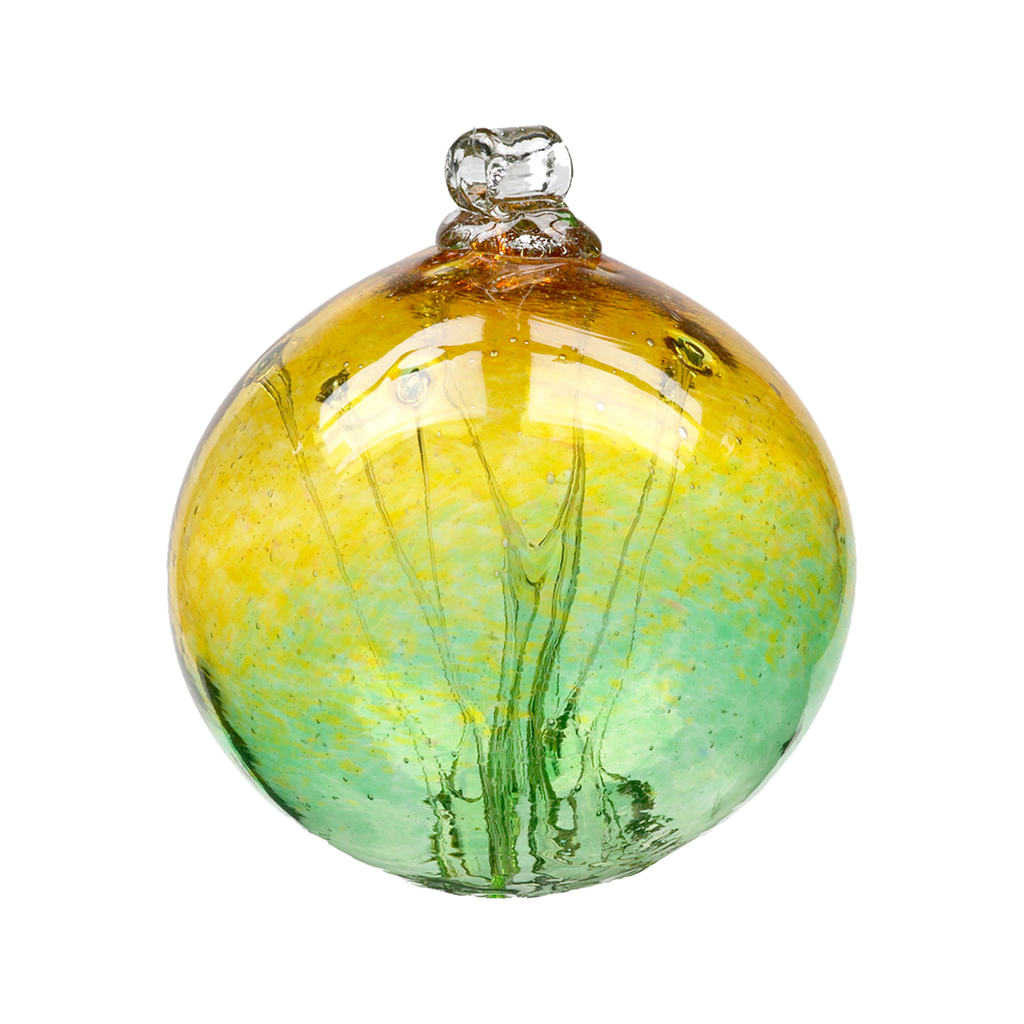Glass orb with amber glass on top and green glass on the bottom and webbing pulled from bottom to top on a transparent background.