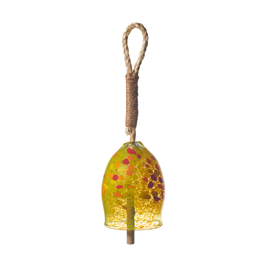 Opaque yellow bell with yellow, orange and red spots with a rope and wood toggle on a transparent background.