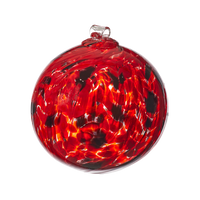 Red and black glass orb on a transparent background