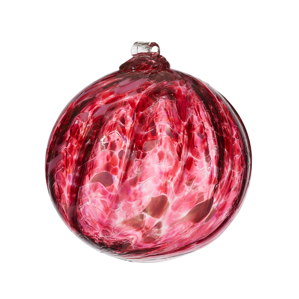 Pink glass orb on a transparent background