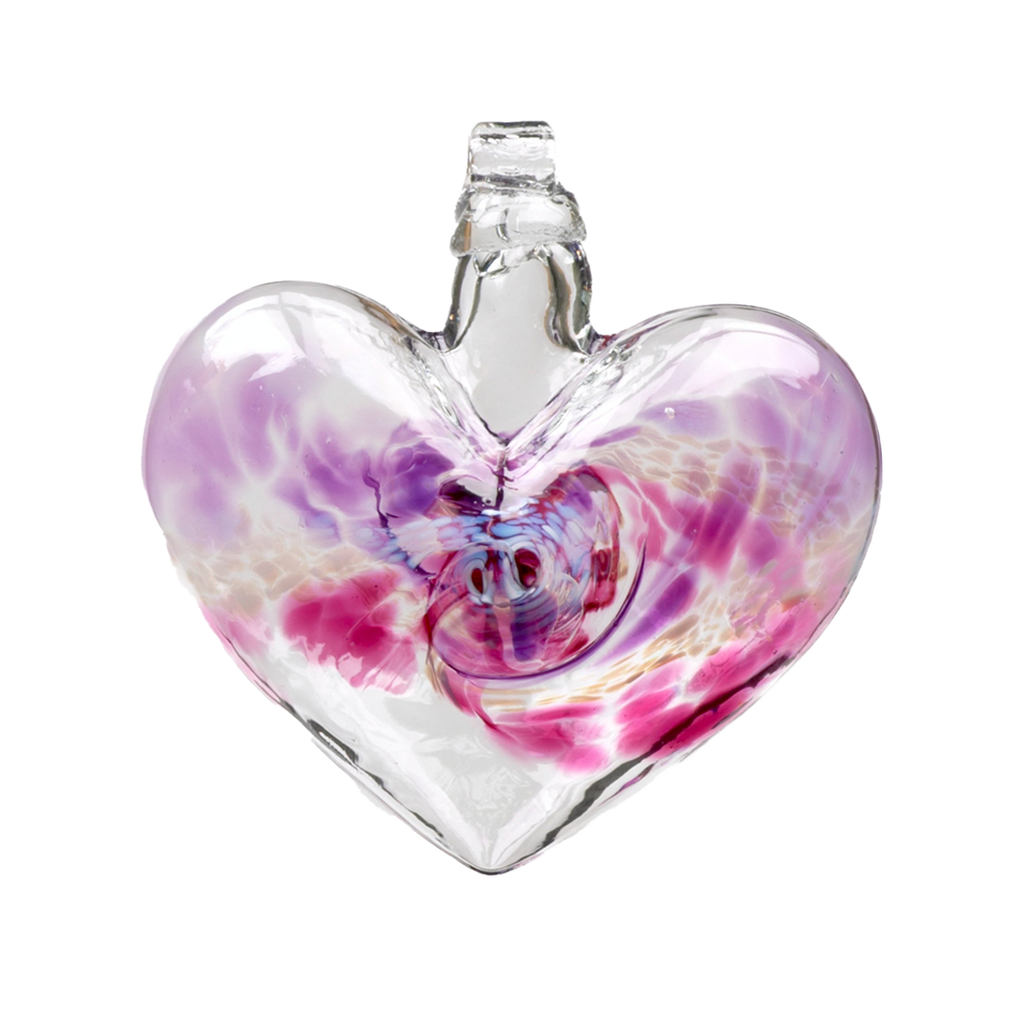 Glass heart with purple on top, white swirled across the middle and pink on the bottom on a transparent background.