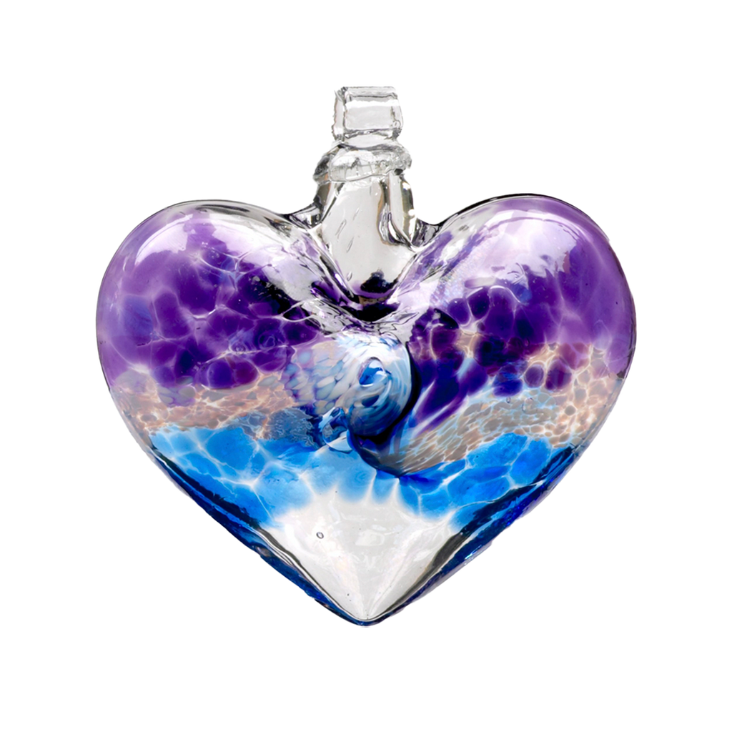 Glass heart with purple on top, white swirled across the middle and blue on the bottom on a transparent background.